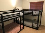 Bedroom 3 has two sets of bunks, enough space for all your guests